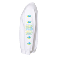 Side view of a white crewneck sweatshirt sleeve with lotus symbols and spiritual text in blue and yellow, featuring the quote 'When you quiet your mind, you can enter a world of clarity, peace, and understanding