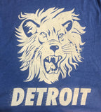 Close-up shot of Detroit lion head graphic shirt in heather blue, custom design