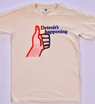 Vintage-style cream shirt featuring Detroit's Happening text and a red thumbs-up graphic