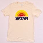 Beige t-shirt featuring a retro-style rainbow design above the bold text 'SATAN' in navy blue