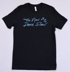 Black T-shirt featuring 'The New Dance Show' logo in light blue script with musical notes